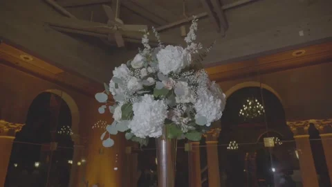 White Wedding bouquet with greenery on the table Wedding reception Stock Footage 174765151