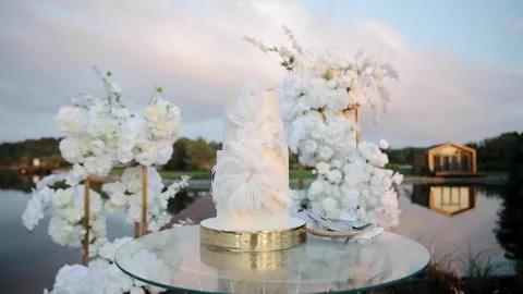 White wedding cake with creative decor. Ceremonial zone close-up. Stock Footage 265221173