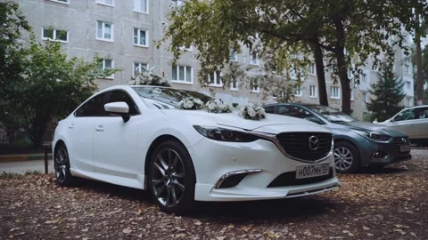 White wedding car with decorations Stock Footage 168385813