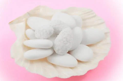 White wedding comfit in a shell Stock Photos