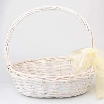 White wicker basket on white background. Used for storing items and reduce .. Stock Photos