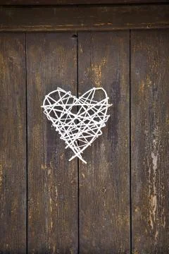 White wicker heart Stock Photos