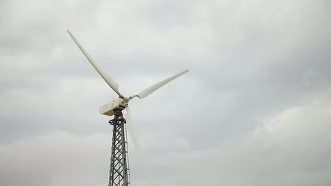 White wind generator closeup, rainy sky bg, grey weather Vidéo 97101189