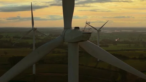 White wind turbine rotating to generate eco friendly electricity. Wind turbine Stock Footage 306015519
