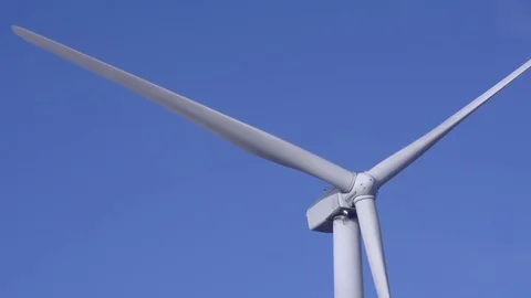 White Windmill Blades and Blue Sky County Fermanagh Northern Ireland Stock Footage 72979330