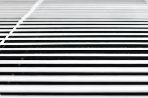 White window blinds on a dark background, parallel lines Stock Photos