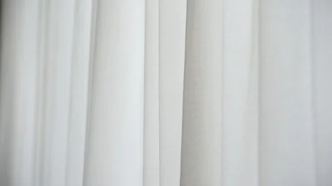White window curtain blown by the wind shot against outdoor light Video stock 102493354