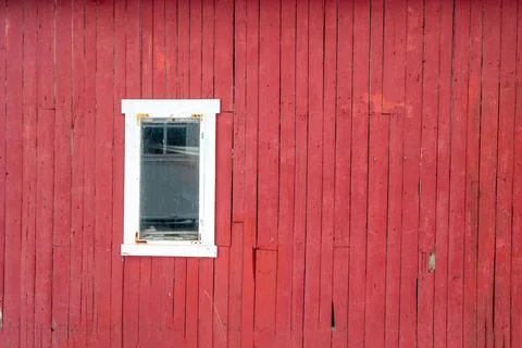 White window on rough decay red wall Stock Photos