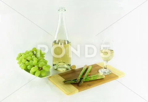 White wine and sides. Stock Photos
