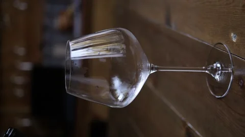 White wine pours gracefully into exquisite glass, creating mesmerizing visual Stock-Footage 268227968