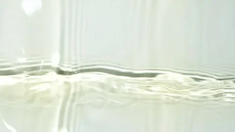 White Wine Splashing in Slow Motion, Overhead View Stock Footage 330947982