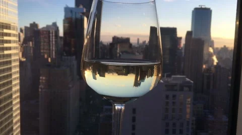 White Wine in Urban Setting New York City NYC Reflection in Wine 8th Ave Stock Footage 61863522