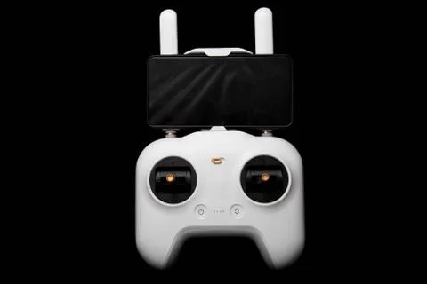 White wireless control panel for the drone and mobile phone for the first per Stock-Fotos