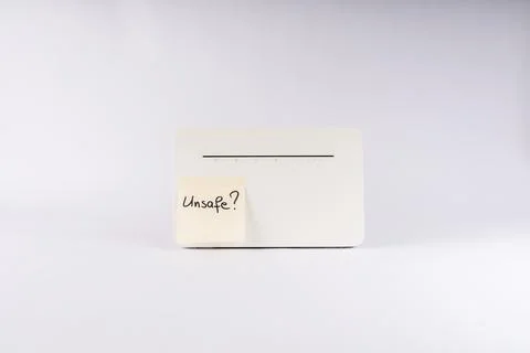 White wireless internet router device featuring a yellow sticky note with t.. Fotos Stock