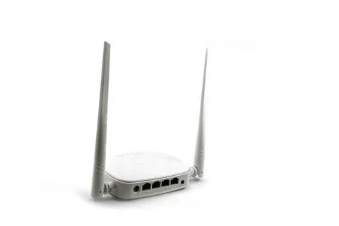 White wireless internet router with two antennas isolated on white Stock Photos