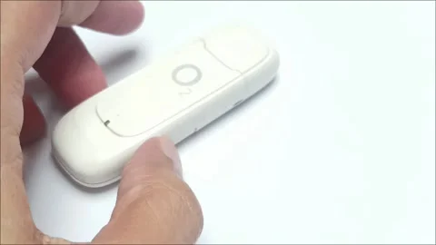 White Wireless USB Modem Dongle for Mobile Internet Broadband Video stock 335804713