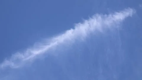 White Wispy Cloud Formation Against Clear Blue Sky Natural Weather Background Stock Photos