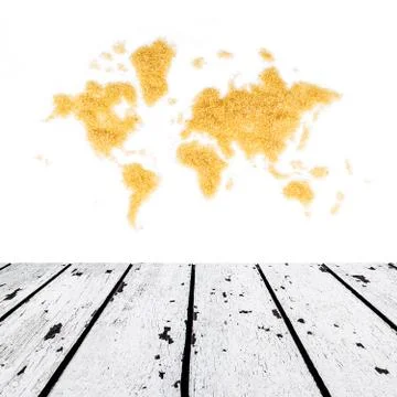 White wooden floor and map of the world made of sugar front Stock Photos