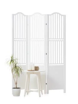 White wooden room divider screen with potted plant and side table, home inter Stock Photos
