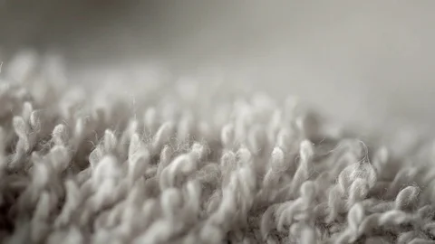 White wool fiber texture extreme close up background UHD stock footage. Stock Footage 77780551