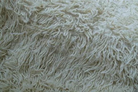 White wool with white top texture background. Cozy fur background in cream tones Stock-Fotos