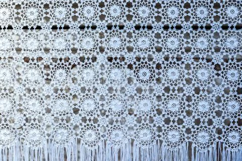 White woven lace patterned tablecloth Stock Photos
