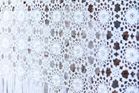 White woven lace patterned tablecloth the vintage white woven lace pattern... Stock Photos