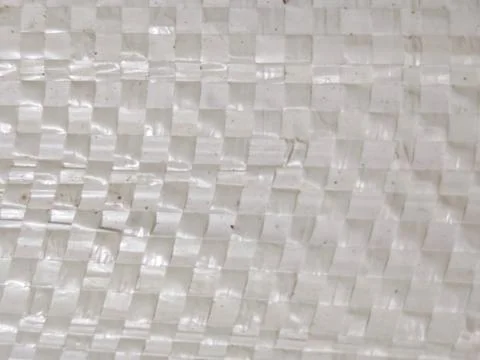 White Woven Plastic Texture Background With Abstract Pattern Stockfoto's