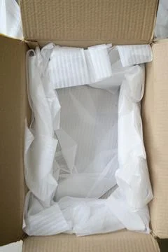 White wrap bubble put in brown box Foto stock