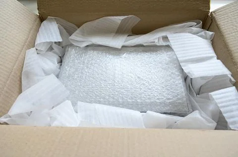 White wrap bubble put in brown box Foto stock