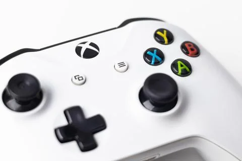 White Xbox One S Controller, Joystick on a white background close up photo Stock Photos