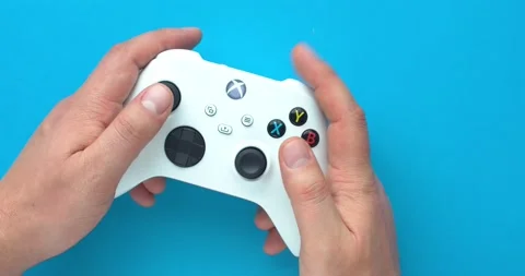 A White Xbox Wireless Controller, Robot White. Compatible Xbox Series X|S, Xbox Stock Footage 146144713
