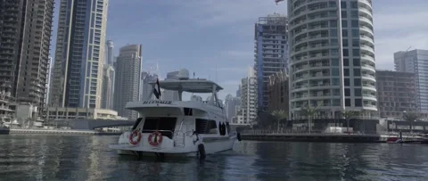 White Yacht In Dubai Marina Water Luxury Lifestyle Boat Sea Skyline Downtown Stock Footage