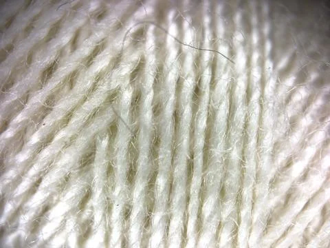 White yarn thread texture close up macro concept for knitting, textile industry, Stock Photos