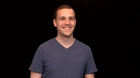 A white young Man on black background is happy of success Vidéo 146263635