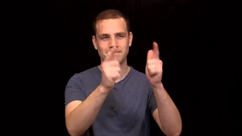 A white young Man uses two hands to point Vidéo 146263620