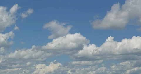 Whiter Clouds in a Blue Sky in Summer (Time Lapse) Stock-Footage 209875345