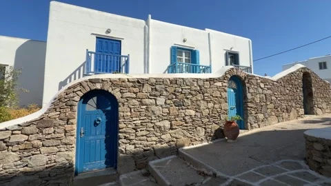 Whitewashed House with Blue Doors Mykonos Greece - Static View Stock Footage 346736144