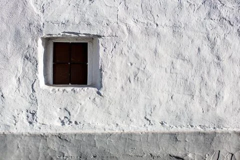 Whitewashed Wall With Window in Afternoon Light, Villaviciosa De Cordoba Stock Photos