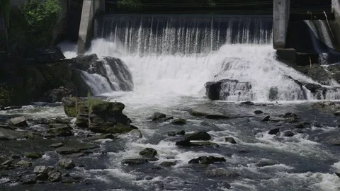 Whitewater flowing down river dam Stock Footage 74831754
