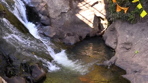 Whitewater flowing over rocks in small river Stock Footage 104823243