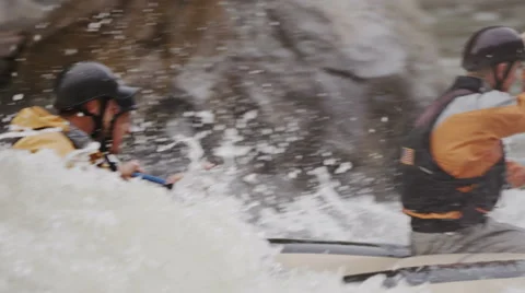 Whitewater Rafters In Slow Motion Navigating Massive Rapid In Slow Motion Stock Footage 64308730
