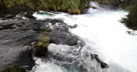 Whitewaters rapids and waterfall inside a green forest scenery at Patagonia Stock-Footage 118002778