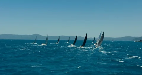Whitsundays aerial yacht race underway Ocean Coral Reef Stock Footage