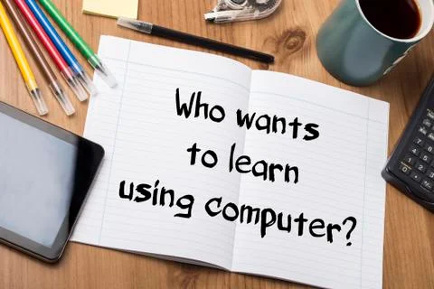 Who wants to learn using computer? - Note Pad With Text Stock Photos