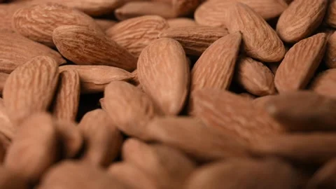 Whole Almond Background Angled Macro Close Up Healthy Food Stock Rotating Video Stock Footage 340753176