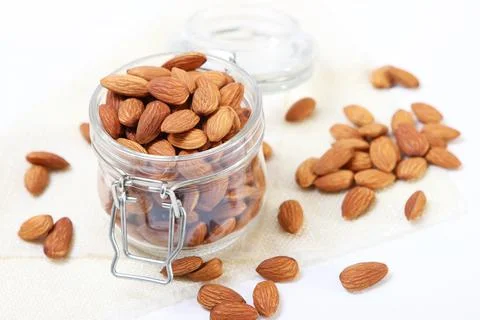 Whole almonds on the table. Stock-Fotos