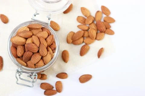 Whole almonds on the table. Stock-Fotos