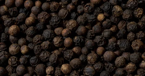 Whole black pepper background. Video stock 277917628