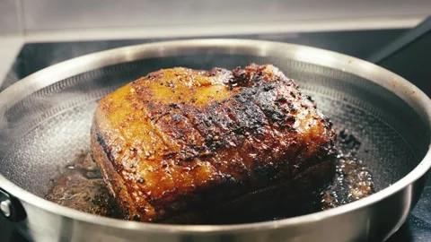 Whole Brisket Searing in Pan Stock Footage 323650154